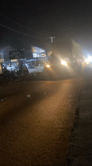 Covered truck observed traveling Lagos road at night