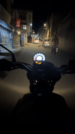 Night ride through Leh's streets, shot from the saddle