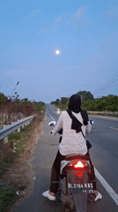 Evening motorcycle rides and moonlit landscapes captured in Lhokseumawe