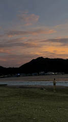Dusk settles over San Juan del Sur's beach and streets