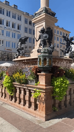 Marienplatz up close: fountain and Gothic town hall details