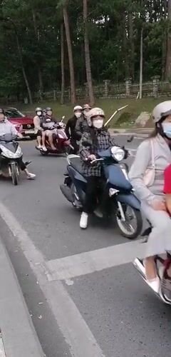 Da Lat street life: roses, colonial domes, and motorbikes