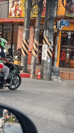 Traffic congestion observed on Thai road with mixed vehicles