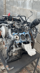 Disassembled car engine documented on stand in Piperevo, Bulgaria
