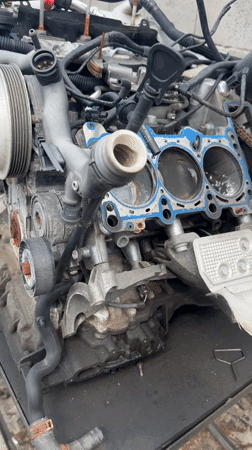 Disassembled car engine documented on stand in Piperevo, Bulgaria