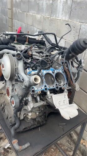 Disassembled car engine documented on stand in Piperevo, Bulgaria