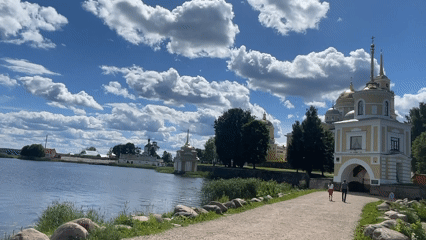Sunny day on the Volga: monastery, boats, and a hang glider