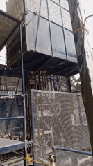 Tower crane and hoist operations underway at South Tangerang construction site
