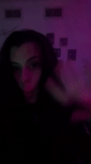 Woman recorded gesturing in purple-lit room in northern Israel