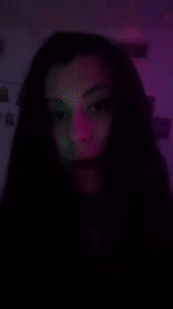 Woman recorded gesturing in purple-lit room in northern Israel