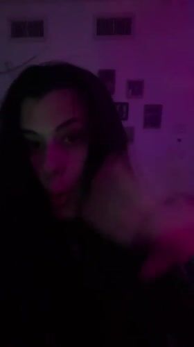 Woman recorded gesturing in purple-lit room in northern Israel