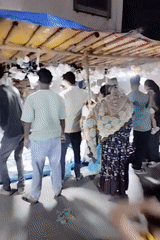 Dhaka night market buzzing with food, vendors, and street activity