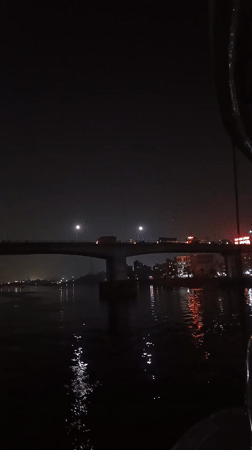 Nighttime bridge activity documented in Mirerbag, Bangladesh