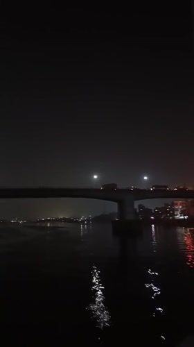 Nighttime bridge activity documented in Mirerbag, Bangladesh