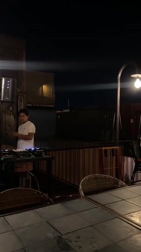 Late night dining scene captured at outdoor Oaxaca restaurant