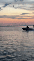 Sunset boat ride and a resting dog in Kokshetau