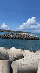 Calm harbor scene captured at Phú Quý breakwater