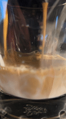 Coffee poured into milk glass captured in Berlin