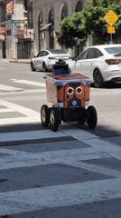 Downtown LA street life: delivery robots, rooftop work, and city views