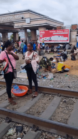 Crowded marketplace bustling near Nigerian Army Shopping Arena, Lagos