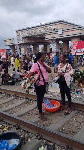 Crowded marketplace bustling near Nigerian Army Shopping Arena, Lagos