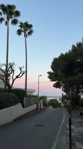 Dusk street scene captured in Le Cannet, France
