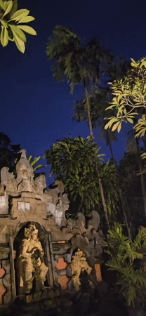 Nighttime documentation of traditional Balinese garden complex in Denpasar
