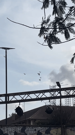 Helicopters fly in formation over Lagos amphitheater venue