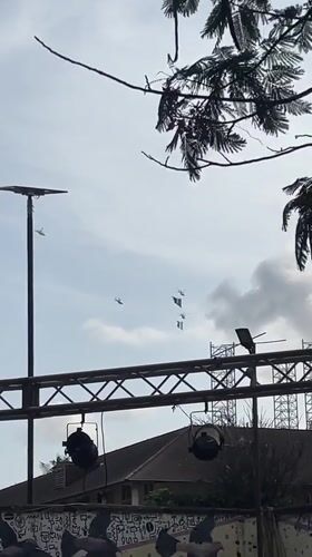 Helicopters fly in formation over Lagos amphitheater venue