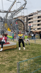 Child plays at outdoor fair in Podgorica