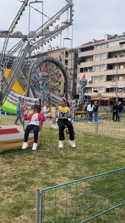 Child plays at outdoor fair in Podgorica