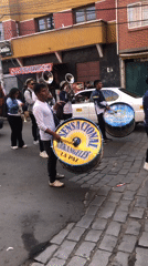 Traditional street parade with dancers and marching bands in La Paz