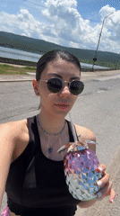 Woman poses for photos at scenic Bulgarian overlook