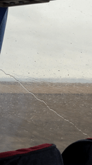 Rainy day observed from bus window in rural Russia