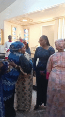 Women in traditional dress gather, greet at Kaduna church