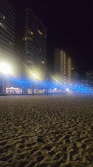 Nighttime beach scene captured in Benidorm, Spain