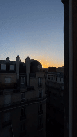 Paris rooftop morning, from sunrise to midday light