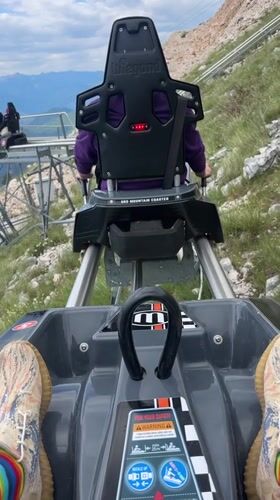 Mountain coaster riders capture scenic descent in Montenegro