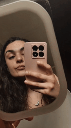Woman documents morning routine with cat and breakfast in Sofia