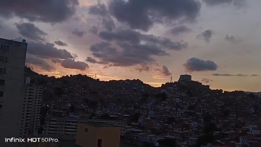 Caracas residents document sunset cityscape and daily life moments