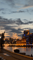 Fireworks and street art along the Iset River at dusk