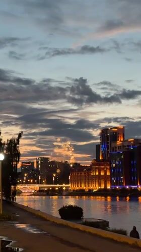 Fireworks and street art along the Iset River at dusk