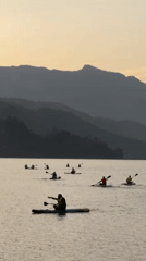 Tourist and local activities documented around Phewa Lake, Pokhara