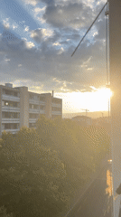 Renens evening light: balcony views and street-level architecture