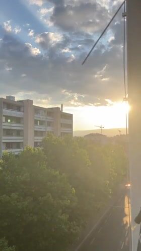 Renens evening light: balcony views and street-level architecture