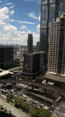 Aerial view captures dense urban skyline with skyscrapers