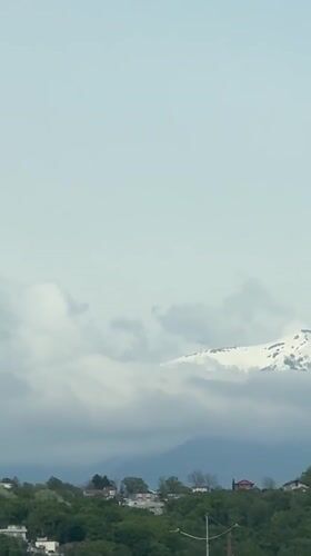 Mountain vistas captured under cloudy skies in Sirius, Russia