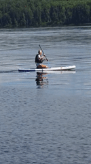 Morning recreation captured along Chaikovsky waterfront: paddleboarding, chess, fishing