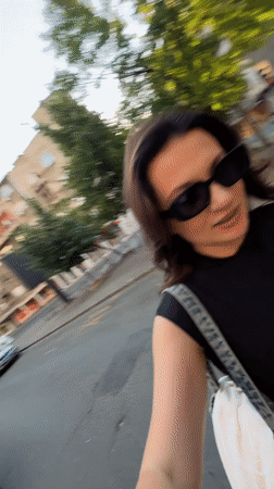 Two women walking on sunny Belgrade streets