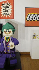 Museum visitors document LEGO and traditional exhibits in Iquique